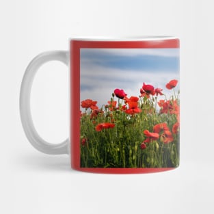 Blood red Poppies against a blue sky Mug